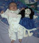 Libby with a doll from cousin Katie