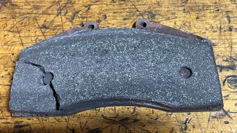 Cracked inner left brake pad
