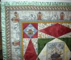 corner of green-edged quilt